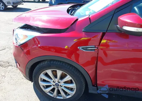 2017 Ford Escape Titanium из США, поврежденный, VIN 1FMCU9J93HUC71671